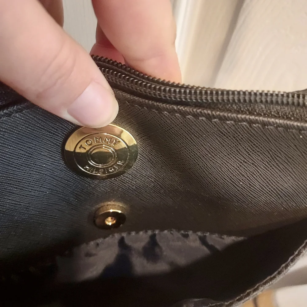 Tommy Hilfiger Black Crossbody Bag with Red and Blue Stripe